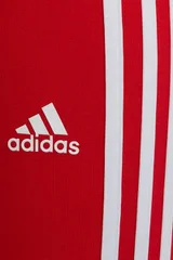 Sportovní dětské červené legíny Adidas s pruhy