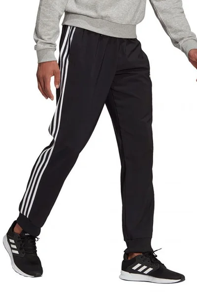 Pánské kalhoty Essentials Tapered Cuff 3 Stripes  Adidas