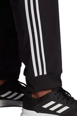 Pánské kalhoty Essentials Tapered Cuff 3 Stripes  Adidas