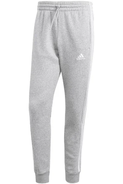 Pánské fleecové kalhoty adidas Essentials se zúženými manžetami ADIDAS