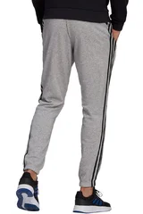 Sportovní pánské kalhoty Adidas šedé s pruhy