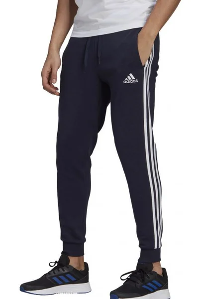 Sportovní pánské tepláky s pruhy Adidas
