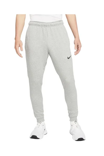 Pánské šedé tréninkové kalhoty Dri-Fit Trapered Nike